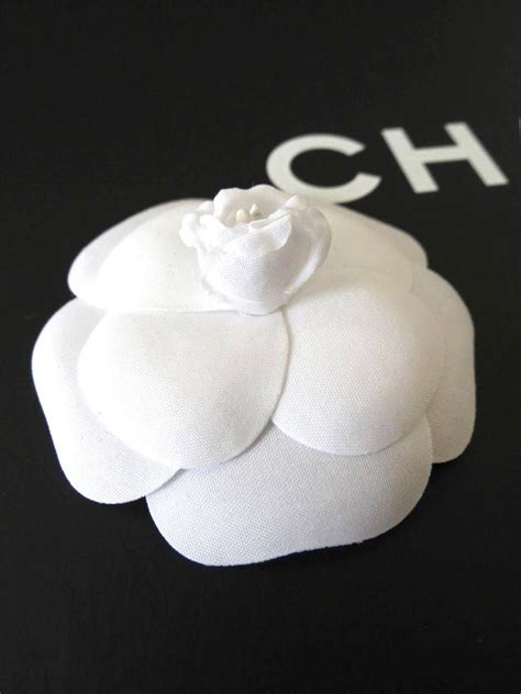 chanel white flowers|Chanel white flower brooch.